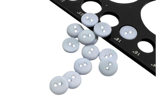 Пуговица пластиковая PS14, 2 прокола, бледно-голубая, 11.5 мм